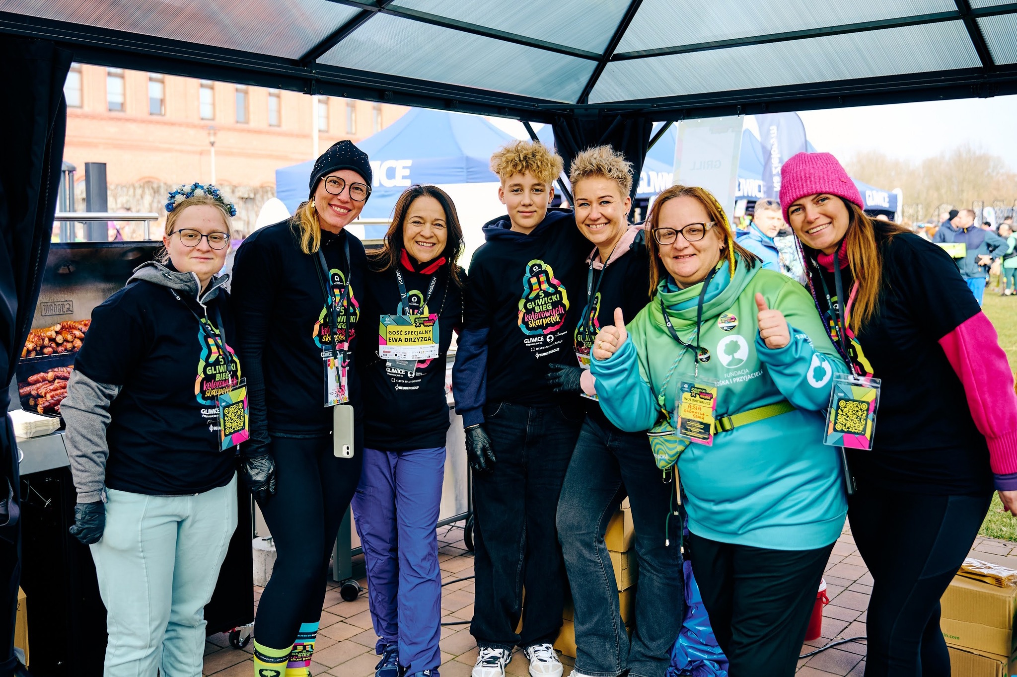 Ewa Drzyzga z organizatorami