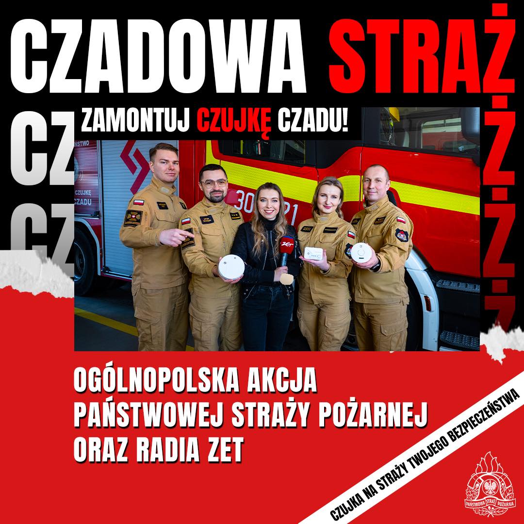 grupa strażaków na tle samochodu, nad nimi napis Czadowa Straż, odbierz czujkę czadu
